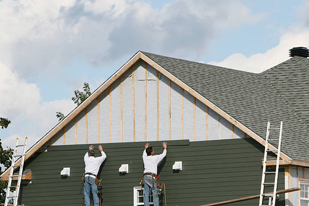Professional Siding Contractor technician working in Kenly, NC
